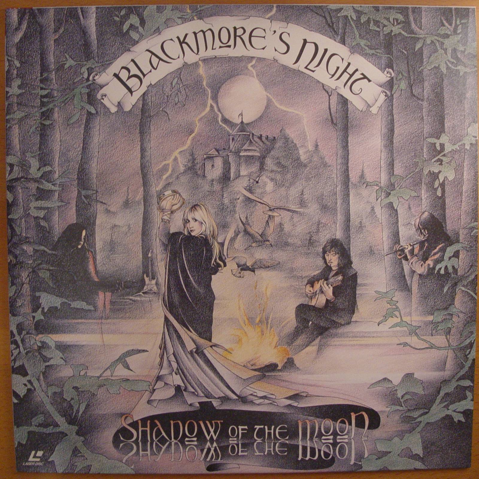 Blackmores night shadow of the moon. Группа Blackmore’s Night. Blackmore's Night Shadow of the Moon 1997. Blackmore's Night обложки альбомов. Blackmore's Night логотип.